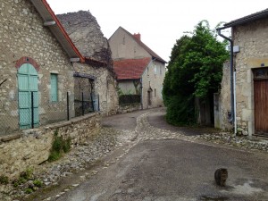 A small street in the town. Check out the cat in the front right - just hanging out. 