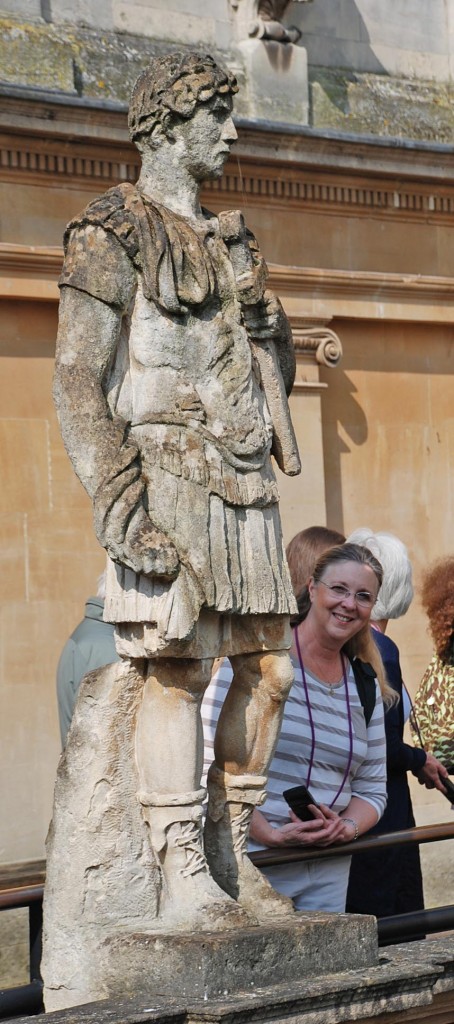 Debbie stands next to a one of the statues, a "family friend", Hadrian.